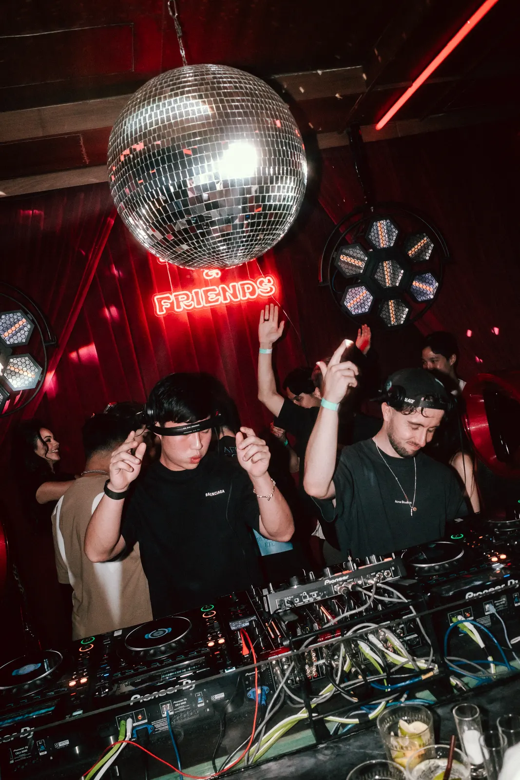 SUBSHIFT DJing beneath a disco ball