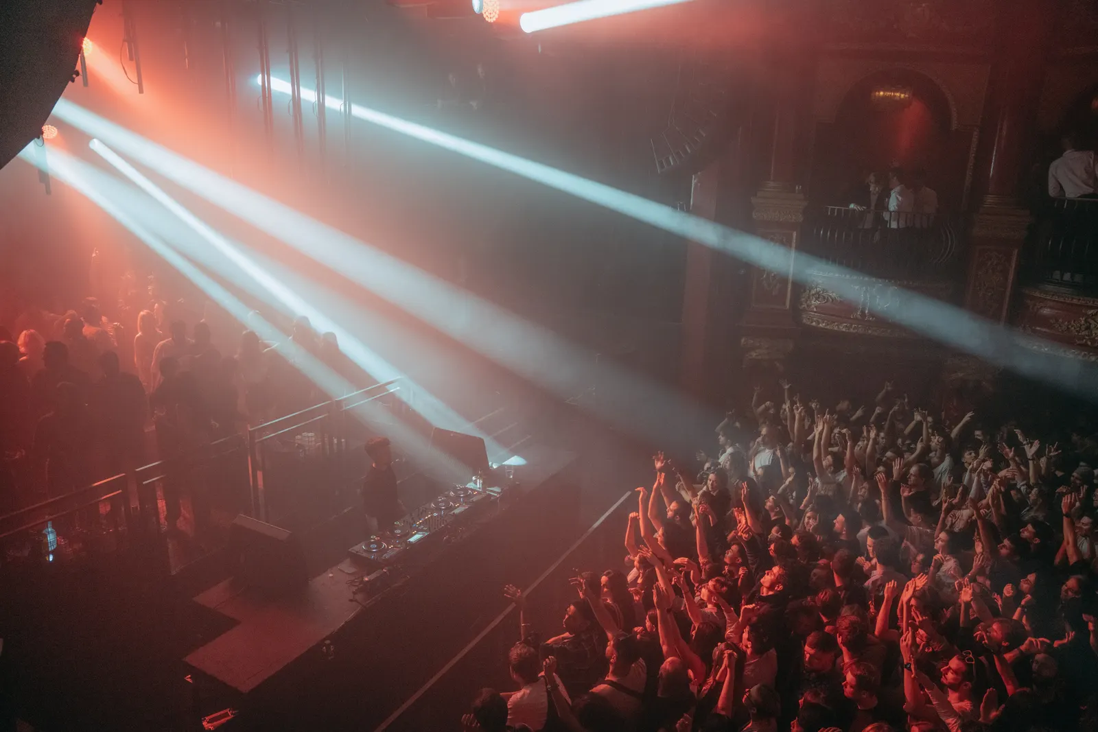 A London crowd beneath stage lights