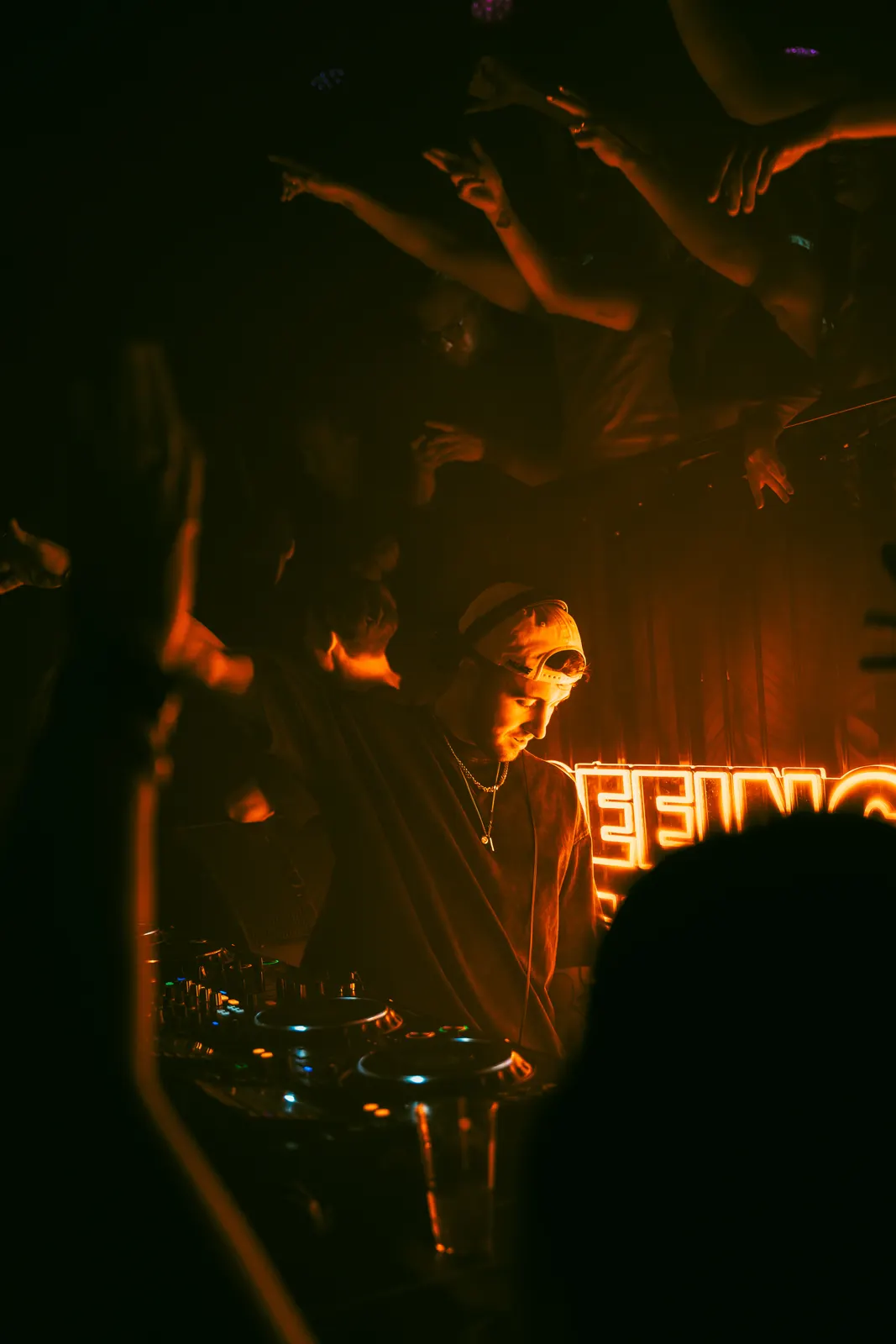 SUBSHIFT at the decks under orange light